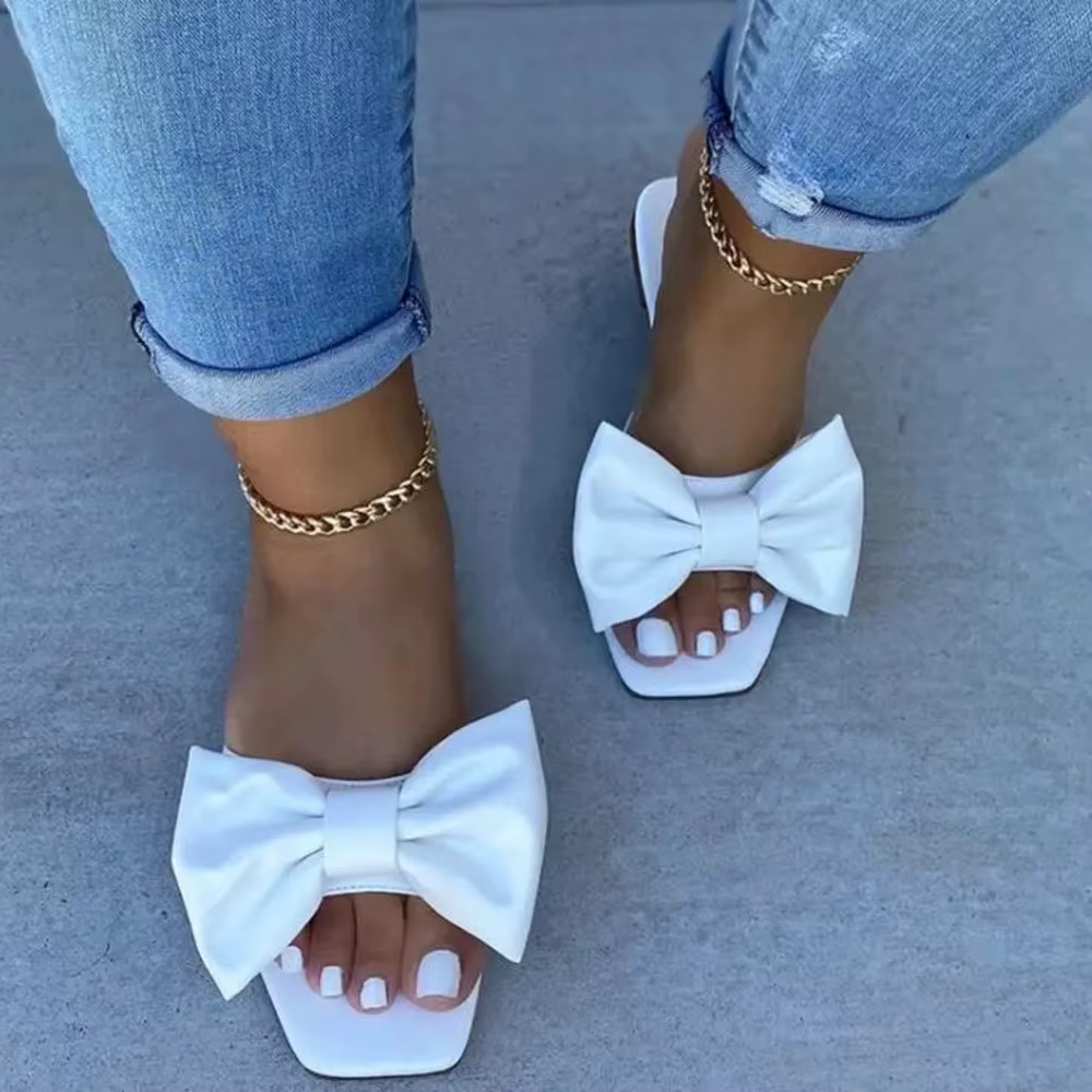 Tong noeud papillon pour femme