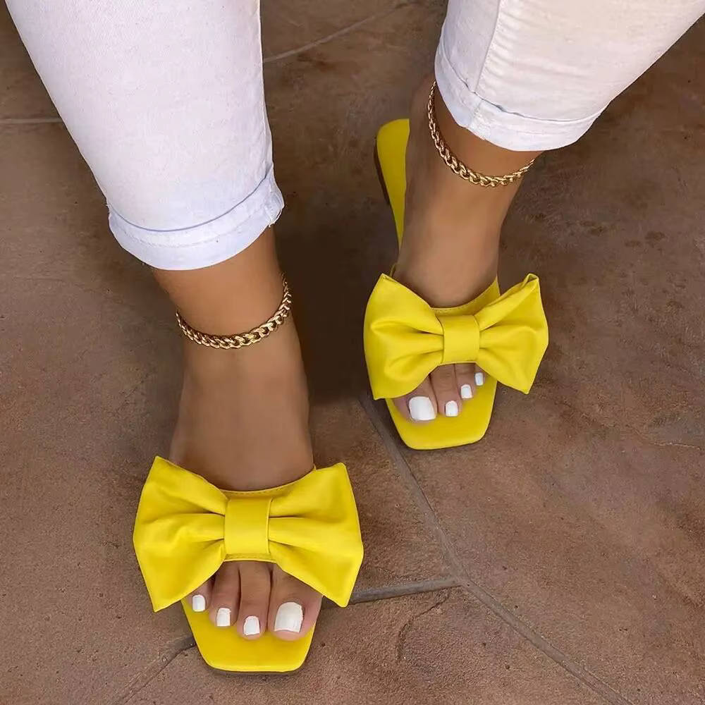 Tong noeud papillon pour femme